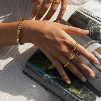 PULSERA DE ACERO CON CORAZONES