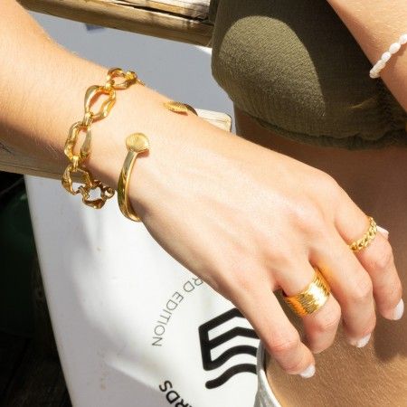 RIGID STEEL BRACELET WITH SHELLS