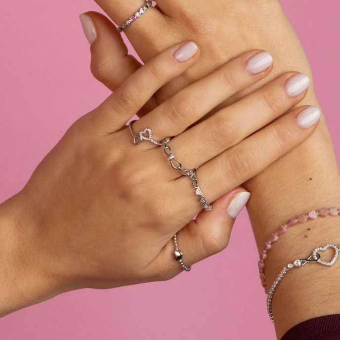 SILVER RING WITH HEARTS