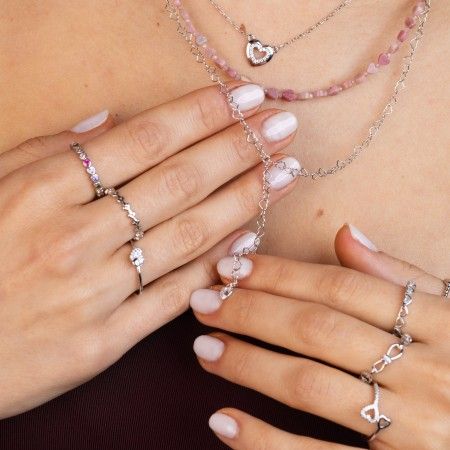 SILVER RING WITH HEARTS