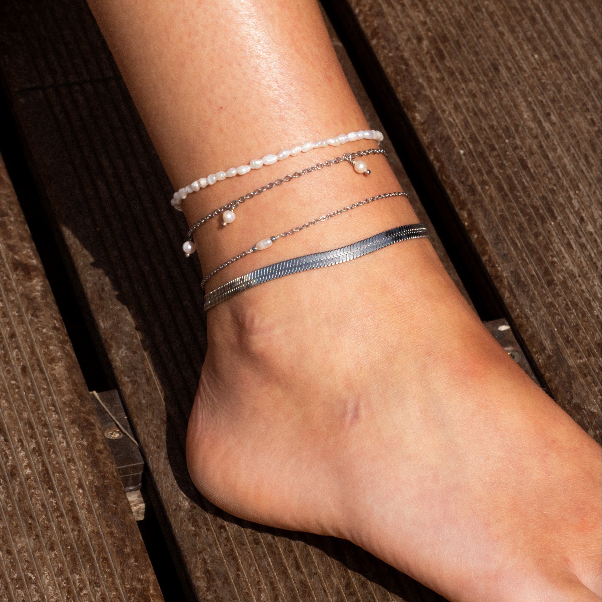 PULSEIRA PÉ AÇO PÉROLA