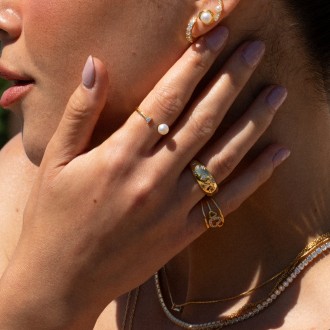 ANILLO DE METAL CON PERLA
