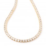 Gold-plated metal with white zircon.