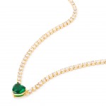Gold-plated metal with green zircon.