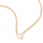 Gold-plated metal with white zircon.