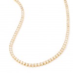 Gold-plated metal with white zircon.